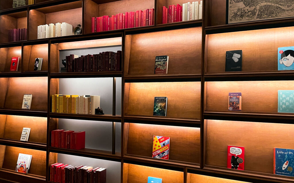 A bookshelf in the Library at Planet Word with a selection of books, some of which have been challenged or banned across the country.