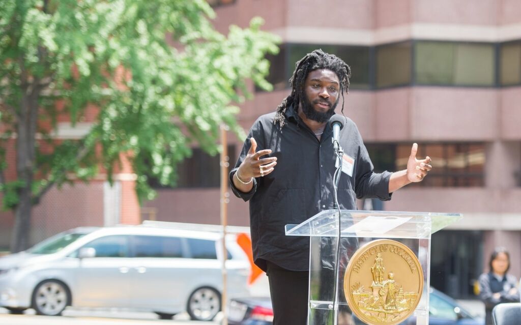 Jason Reynolds addressing crowd at Planet Word opening