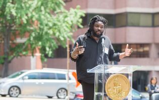 Jason Reynolds addressing crowd at Planet Word opening