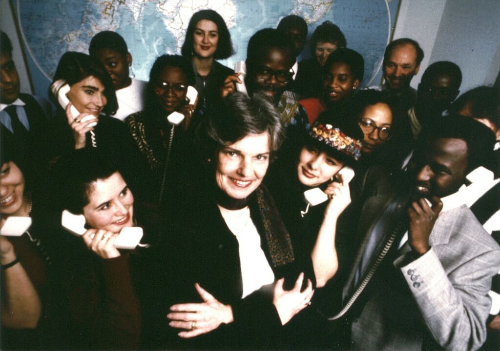 Group of individuals in black tie dress