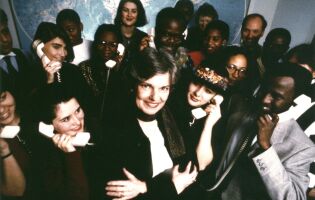 Group of individuals in black tie dress